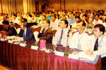 Informative Seminar... Tai (fourth from right) and K Fujiii to his right and other participants listening to a speaker during the siminar.